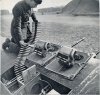 20 x 110mm HS loading the 20mm cannon on an aircraft wing in England.March 1942.jpg