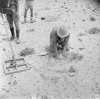 2 South African engineers clear a German minefield in the Western Desert.jpg
