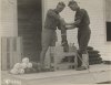 111-SC-11486_-_Aviation_cadets_taught_bombing_at_Ellington_Field,_Houston,_Texas._Filling_the_bo.jpg