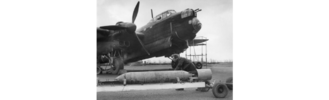 A AP 2000 lb bomb about to be loaded into an Avro Manchester, probably of No. 207 Squadron, ci...png