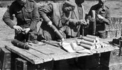 05 - Filling 25 pdr smoke with large pamphlets in Italy.jpg