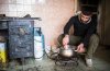 A young man works on the production of hand made missiles in a secret factory in Al-Bab.jpg