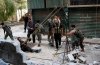 Members of the Free Syrian Army use a catapult to launch a homemade bomb.jpg