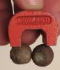 Steel jacketed shrapnel, lead filled, stuck to magnet.JPG