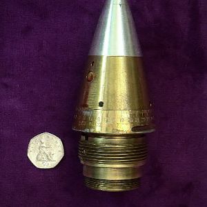 M 502 Fuze for artillery use with 2" in 14 Teeth Per Inch thread.
Booster missing.