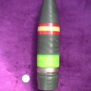 What I believe to be a 75mm KWK40 High explosive projectile wartime stamped and whilst the paintwork